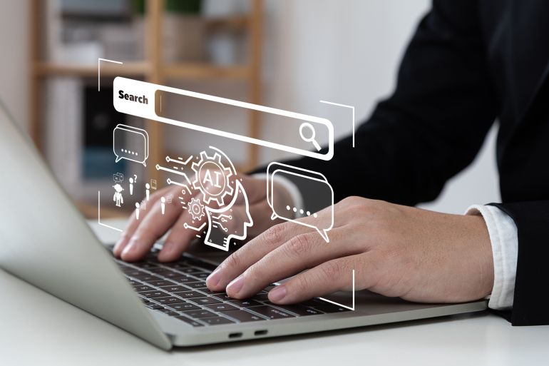 Chatbot with AI (Artificial Intelligence), search engine, businessman using laptop connection to AI, use command prompt for generates idea something or solve problems, digital transformation, SEO. شترستوك