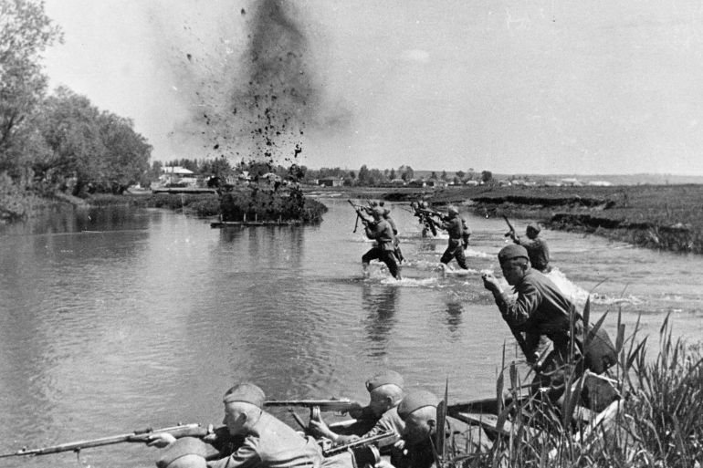 World war 2, soviet infantry crosing a river in ukraine under fire, 1943. (Photo by: Sovfoto/Universal Images Group via Getty Images)